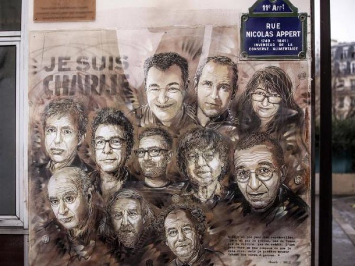 Pintura que muestra a los dibujantes asesinados en Par&iacute;s para el quinto aniversario de la masacre. Fuente: Efe