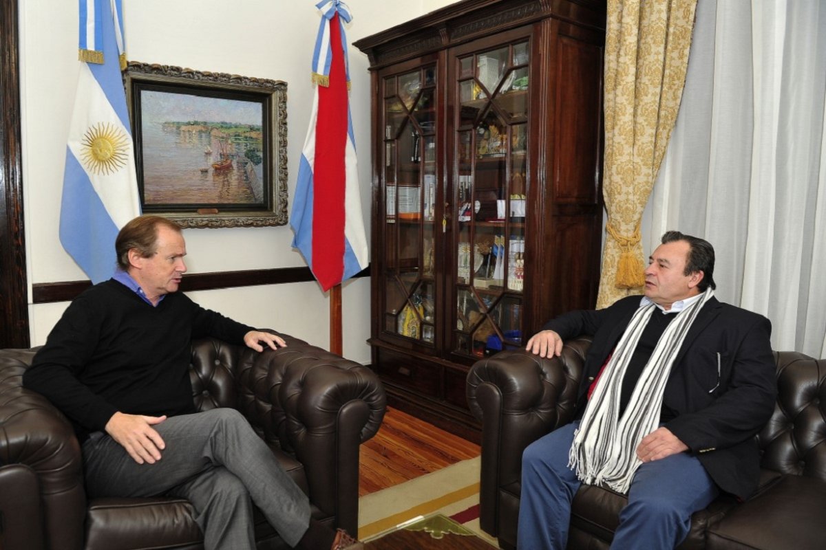 Bordet junto a Bisogni.
