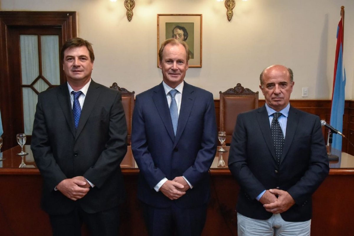 Morchio, Bordet y Benedit en el acto.