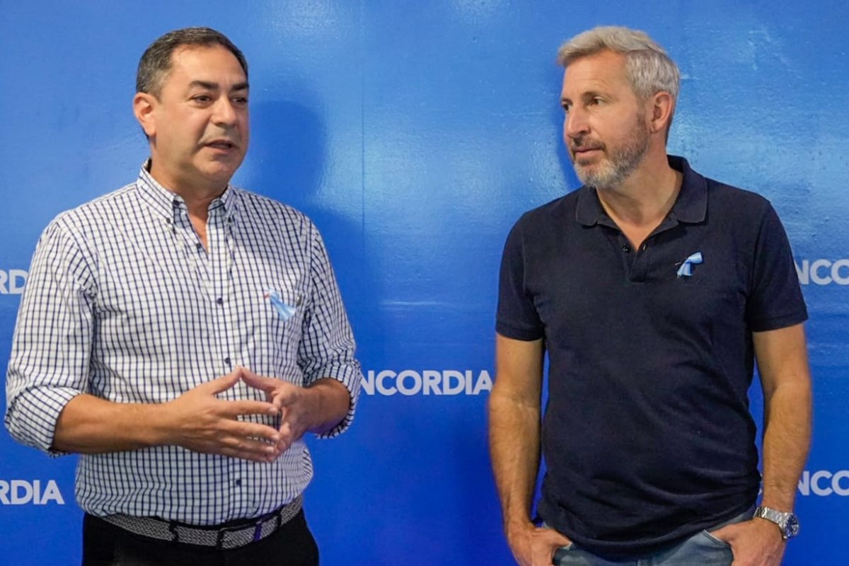 Eduardo Cristina y Rogelio Frigerio.