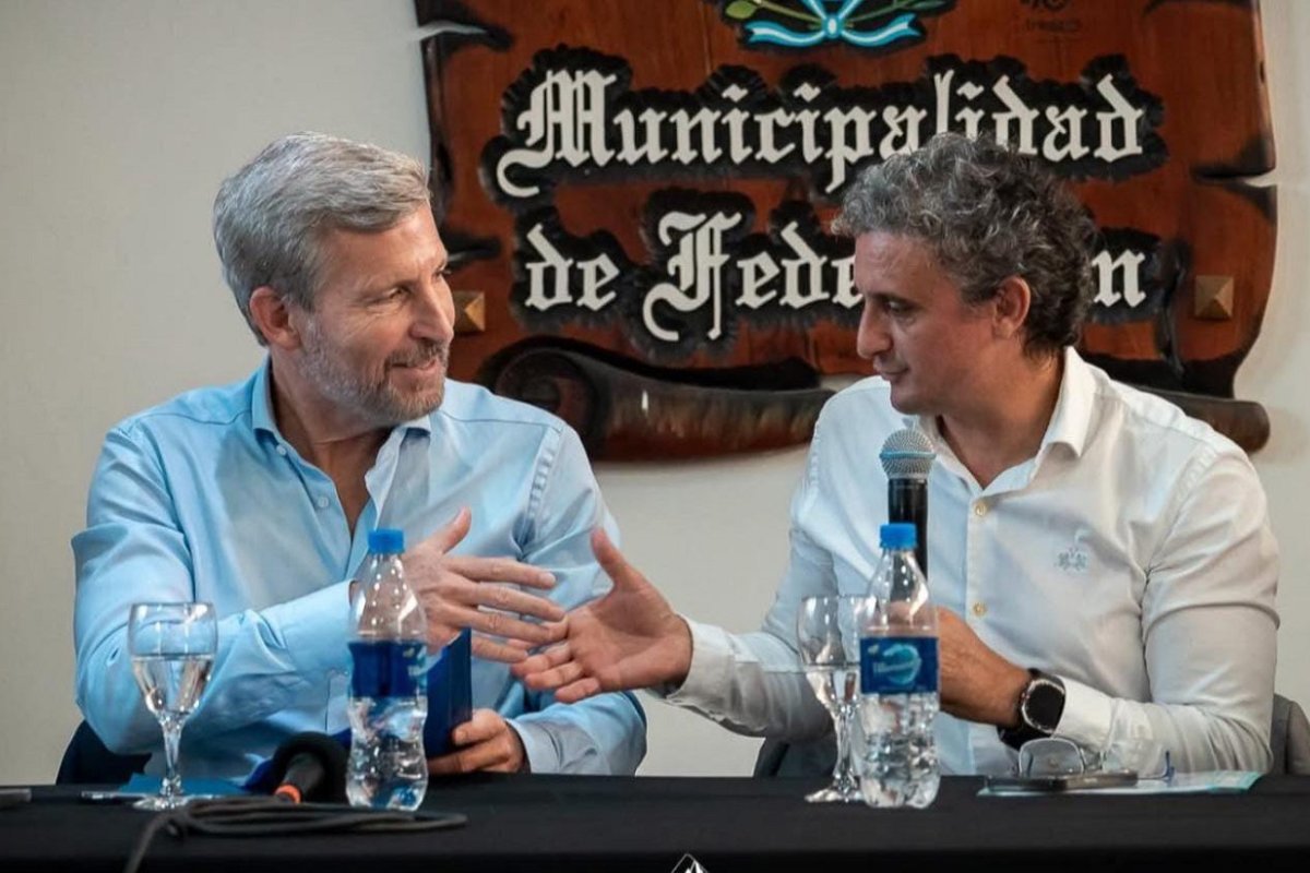 Rogelio Frigerio y Ricardo Bravo.